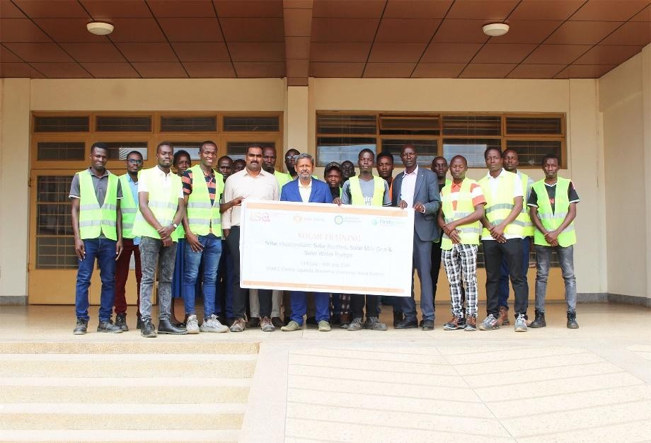 Members of the first cohort of the International Solar Installation Training pose for a group photo at the Faculty of Engineering and Technology after completing the programme