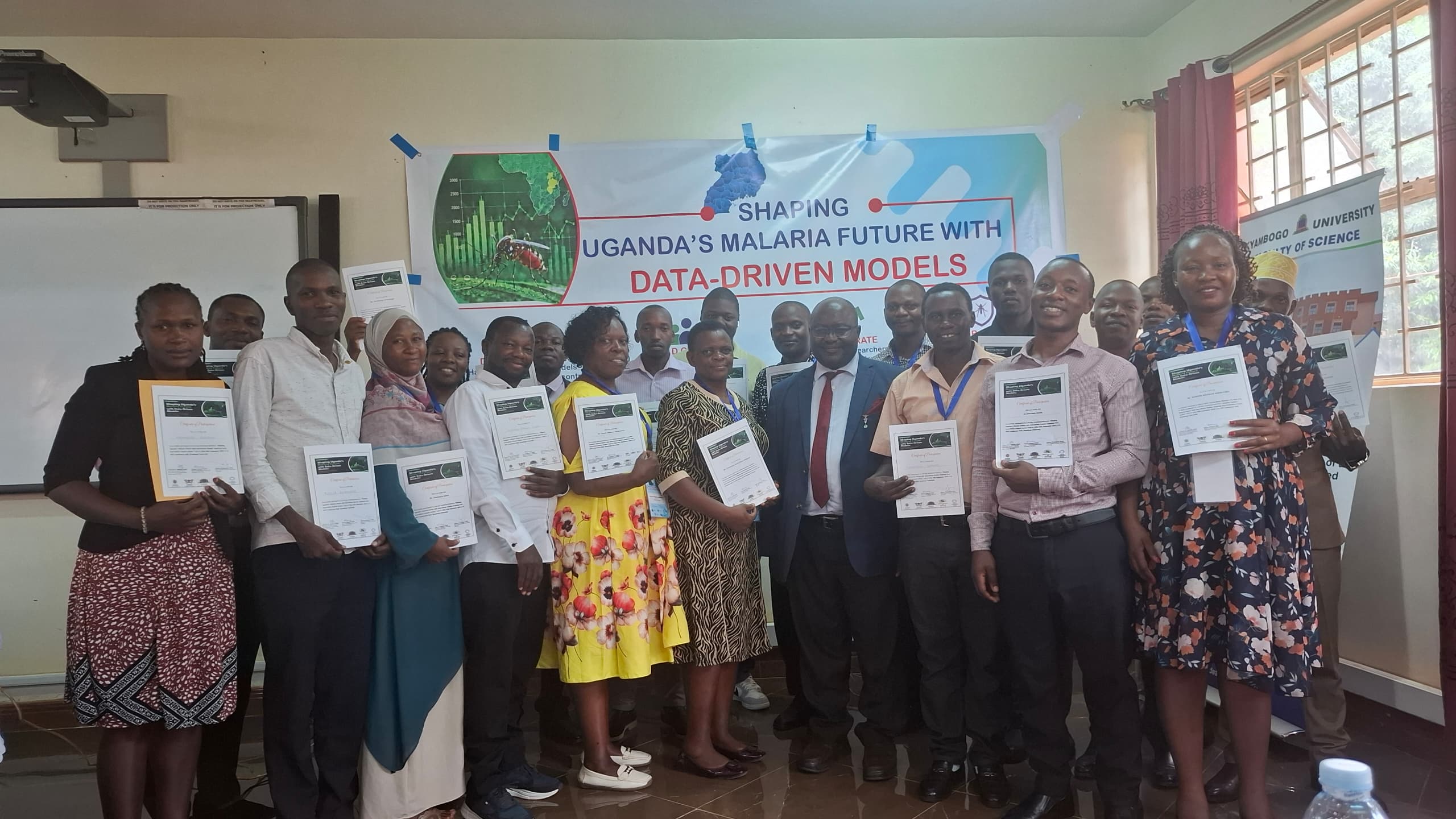 Participants pose with their certificates at the close of the two-day workshop on “Shaping Uganda’s Malaria Future with Data-Driven Models: Inspiring the Next Generation of Control Actors,” held from 15 to 16 September 2026.