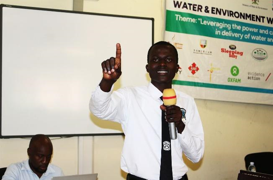A secondary school debater delivers his points during the public speaking session at the youth debate