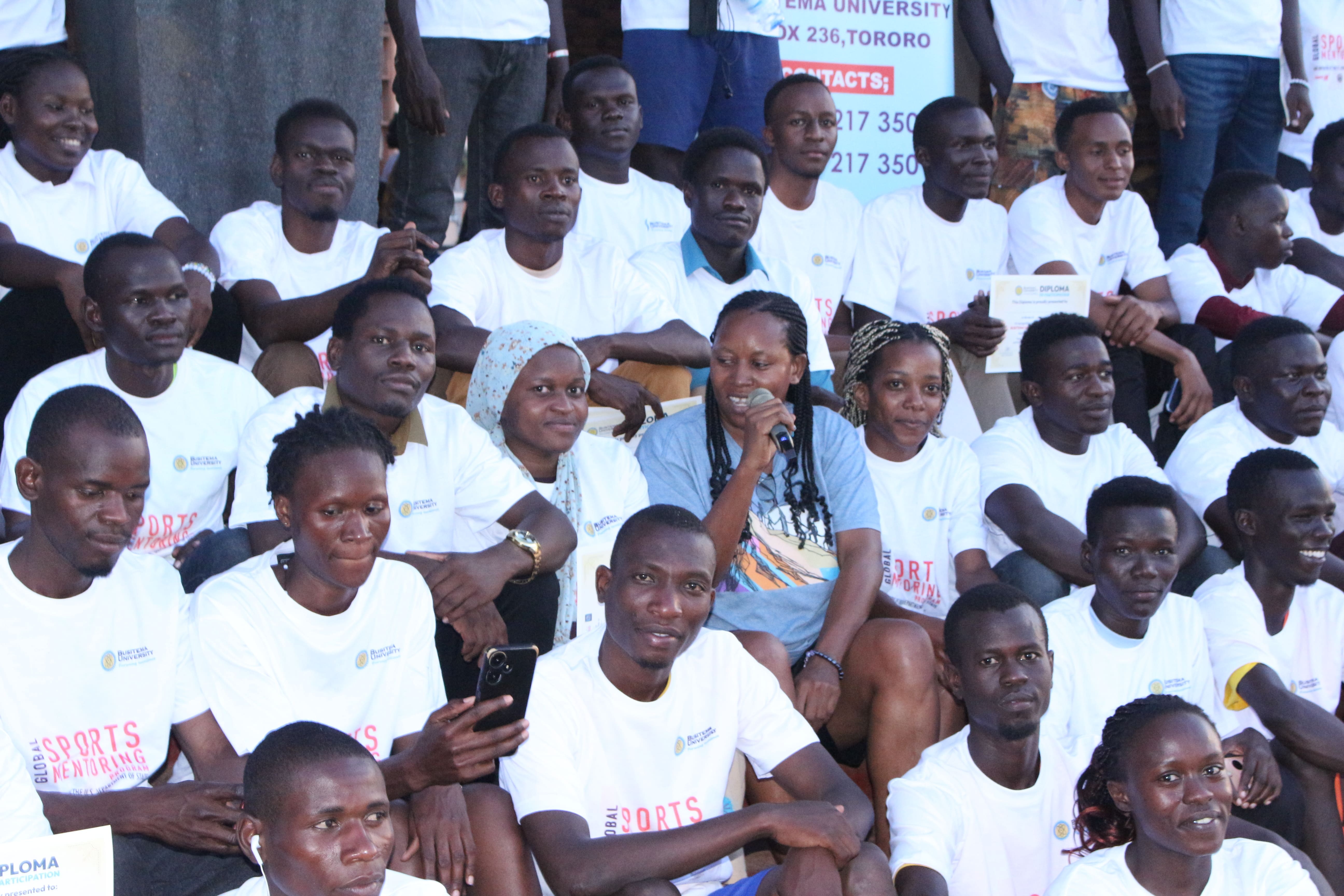 Dr. Agnes Baluka Masajja, Deputy Chief Sports Officer, engages with student-athletes during the Open Sports Gala at the Main Campus Busitema.