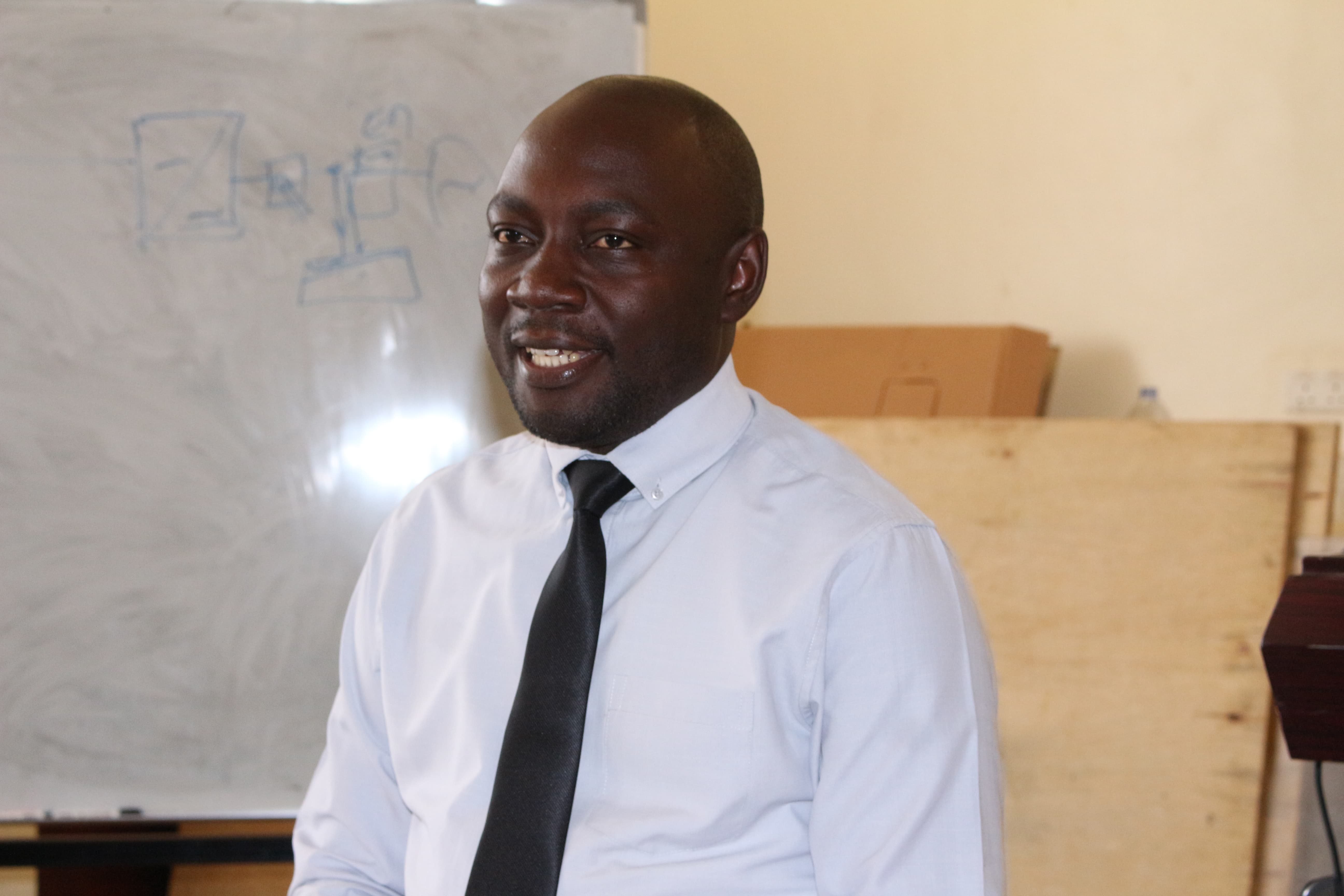 Eng. Dr. Lwanyaga Ddumba, addresses participants during the opening of the training