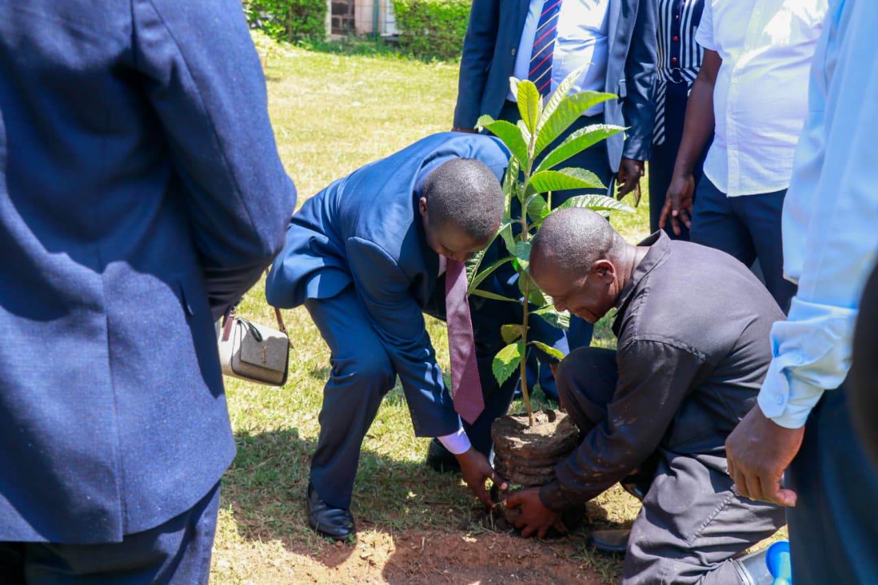 Busitema University Vice Chancellor, Prof. Paul Waako, plants a commemorative tree at Kibabii University, symbolising the growing partnership between the two institutions