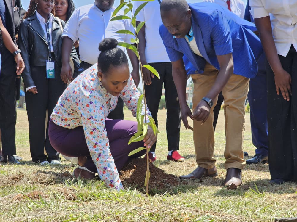 Hon. Phiona Nyamutoro, State Minister for Minerals, plants a tree at Busitema University Main Campus as part of activities marking Youth Mining Day on 14 August 2026.