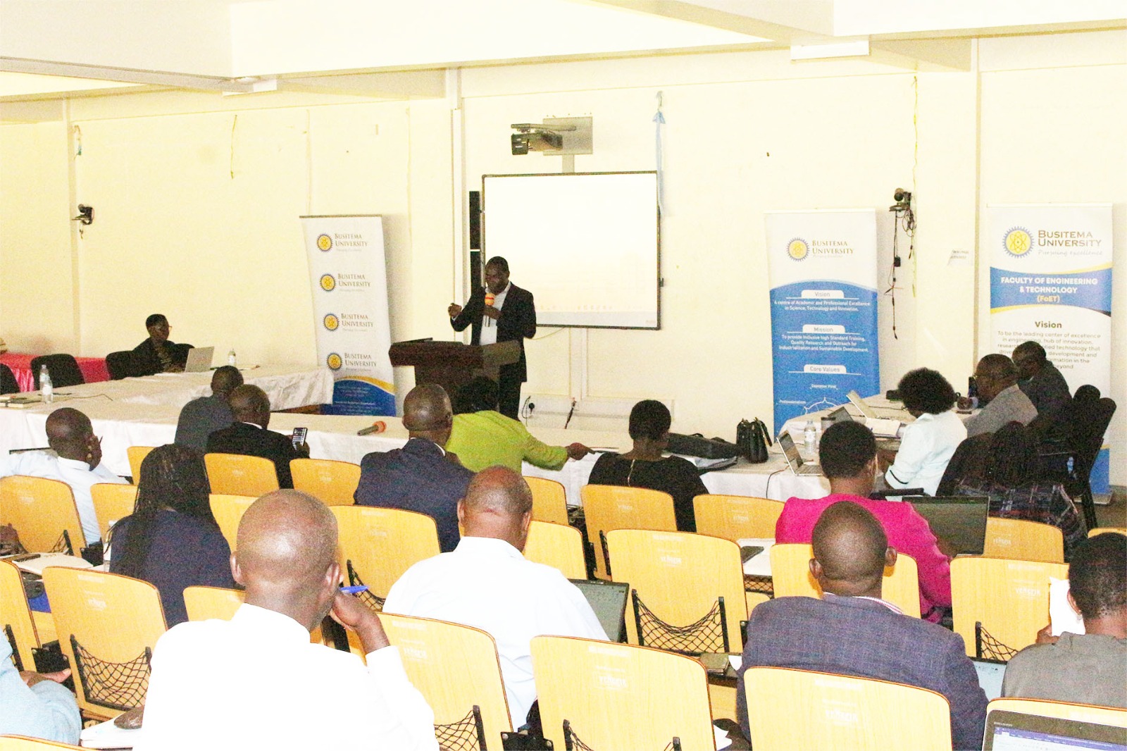 One of the presenters addresses participants during Busitema University's FY 2027/2028 Budget Conference at the Faculty of Engineering and Technology Conference Hall.