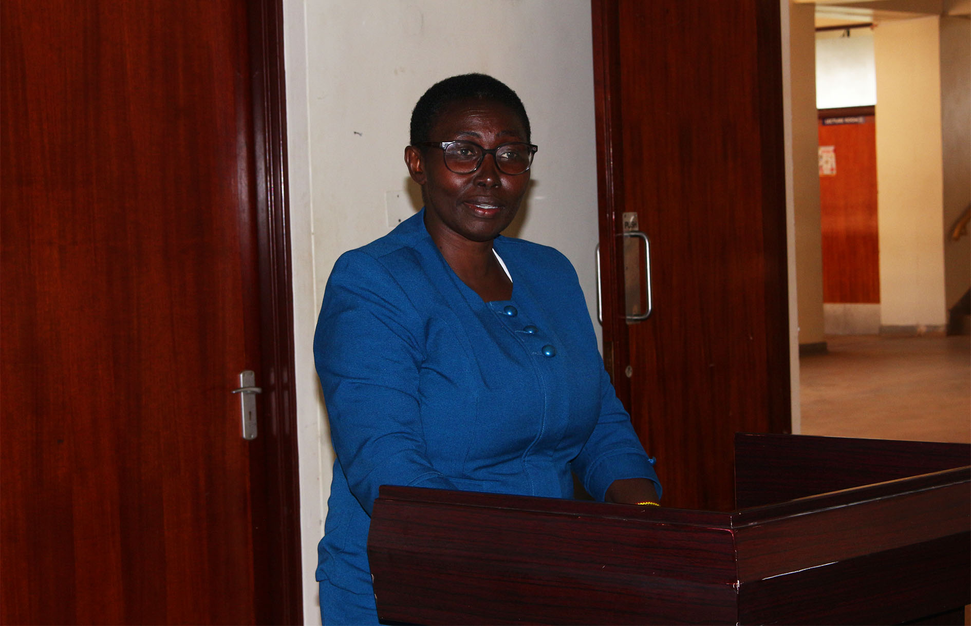 Prof. Saphina Biira, speaks at the closing ceremony of the International Solar Installation Training