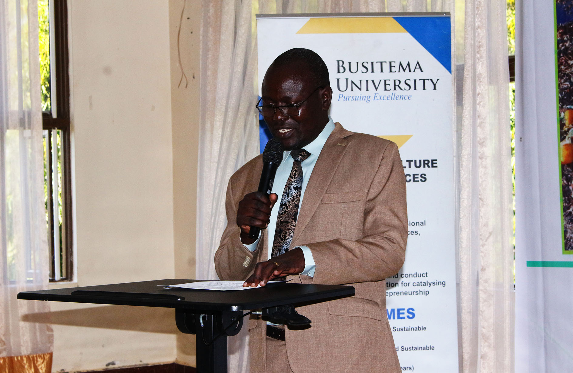 Prof. Egonyu presenting the Waste to Wealth project implementation strategy during the WAWE Workshop