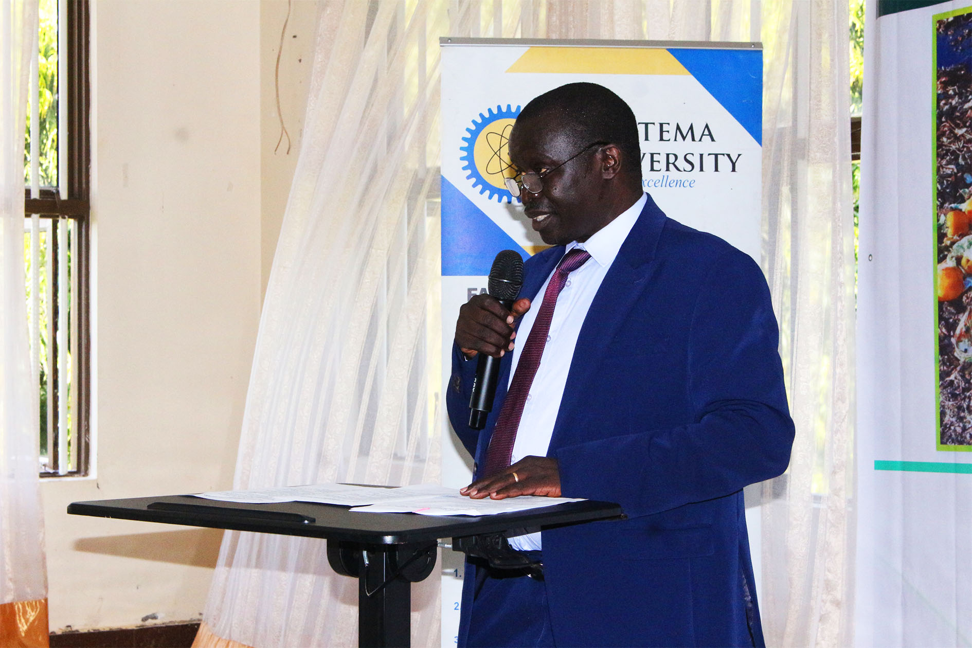 Prof.  Waako addresses participants during the Waste to Wealth Workshop