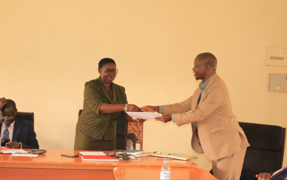 Prof Saphina Biira hands over instruments of power to new FNRES Dean Dr. Masaba Sowedi